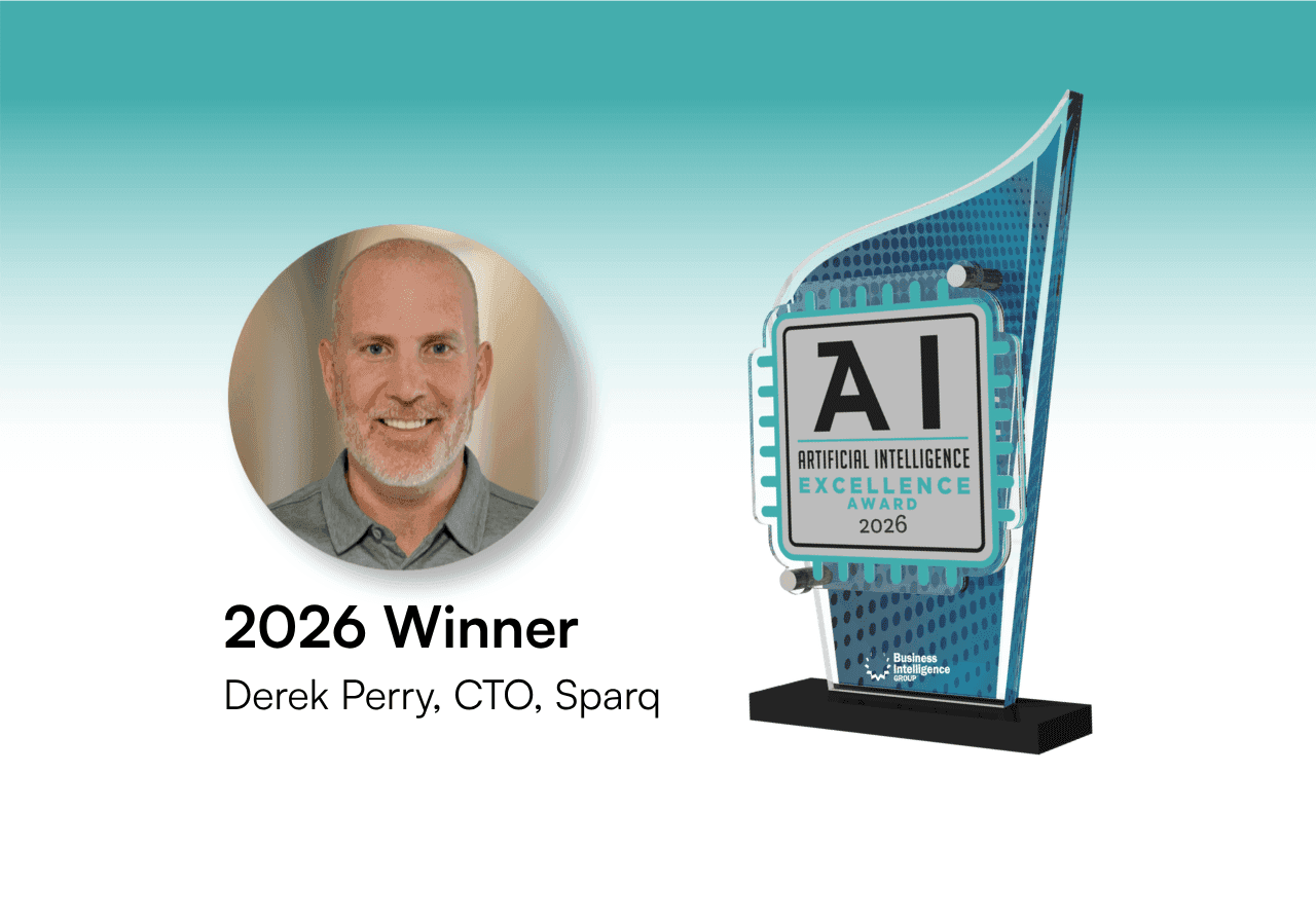 Derek Perry, CTO of Sparq, stands proudly with the 2026 AI Excellence Award trophy.