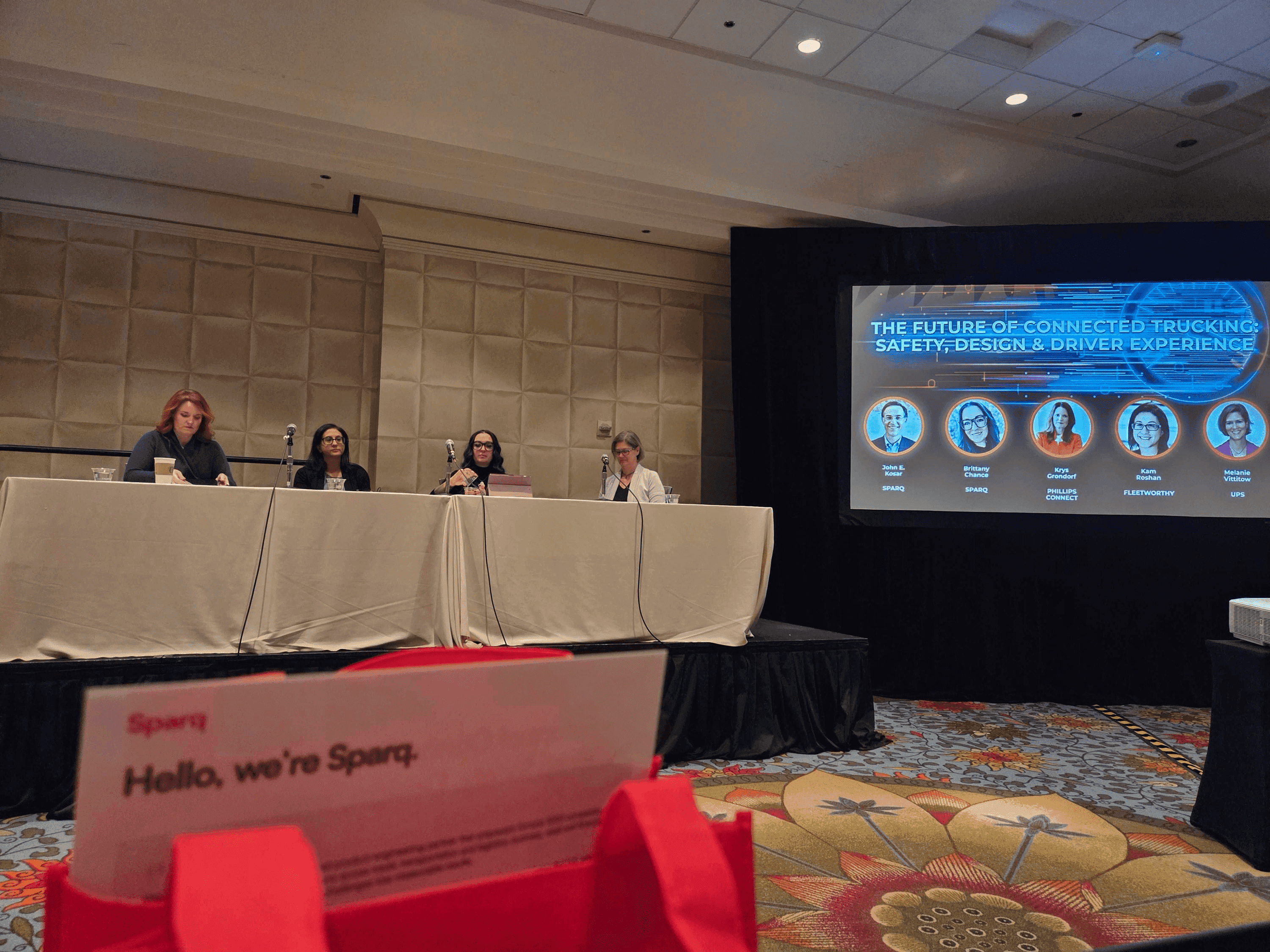 Four women on a panel discussing the future of content at a professional conference.