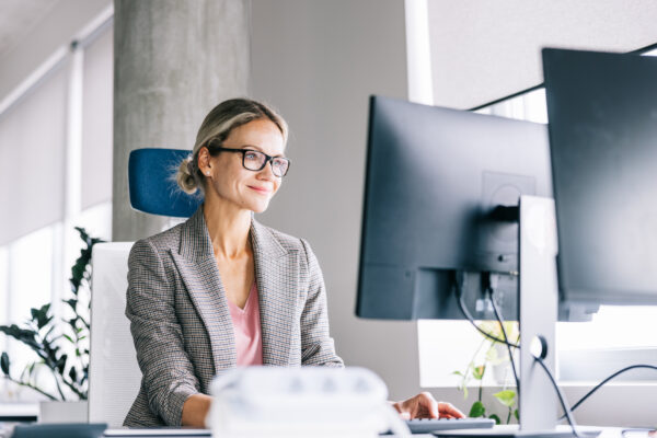 Female financial analyst at a computer